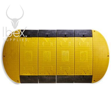 Yellow and black GRP road plate on white background