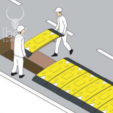 Installation of yellow and black GRP road plate in situ
