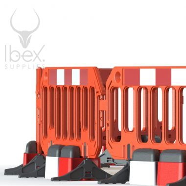 Orange road rock barriers with red and white blocks on white background