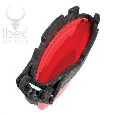 Inside view of red and black road runner barrier on white background